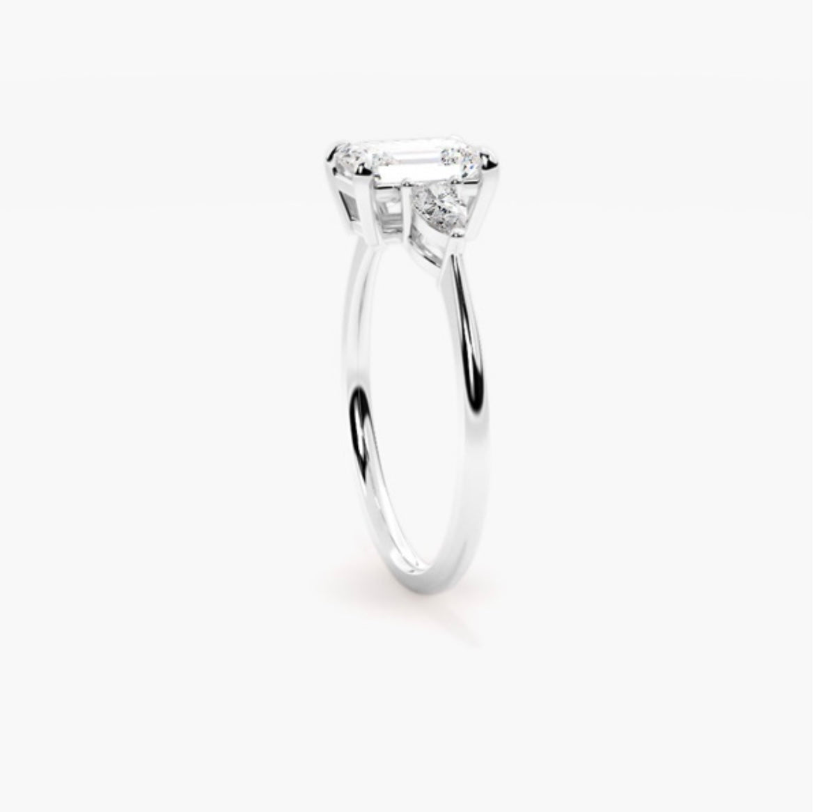 1ct Emerald Cut Lab Grown Diamond Trilogy Engagement Ring with Pear Side Stones – IGI Certified