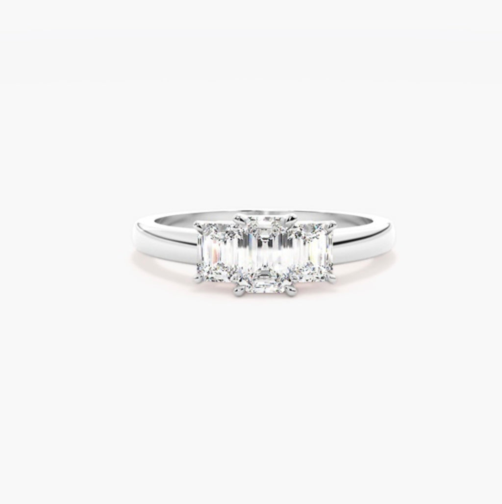 0.75ct Emerald Cut Lab Grown Diamond Trilogy Engagement Ring with Emerald Side Stones – IGI Certified
