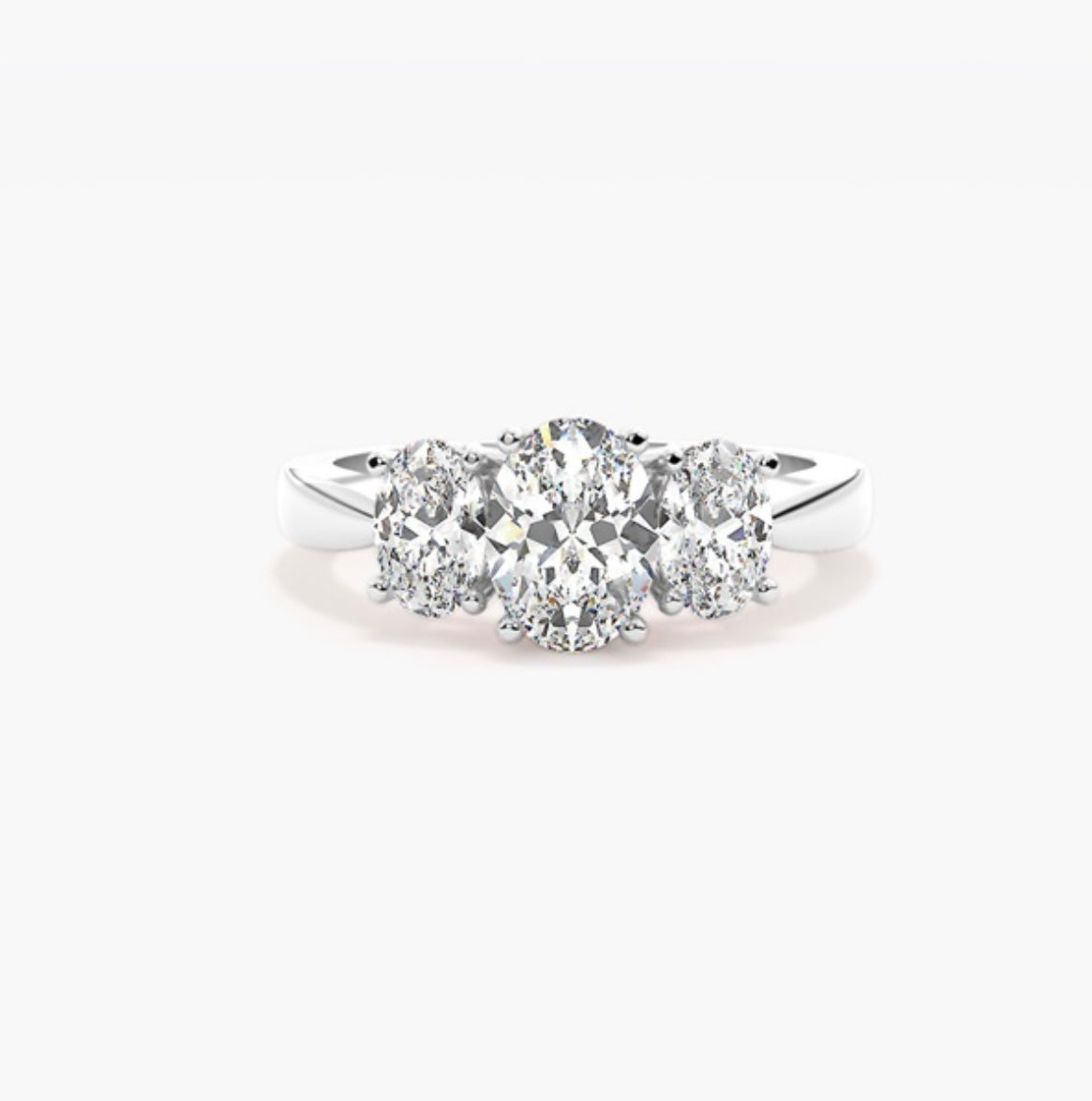 1.5ct Oval Cut Lab Grown Diamond Trilogy Engagement Ring with Oval Side Stones – IGI Certified