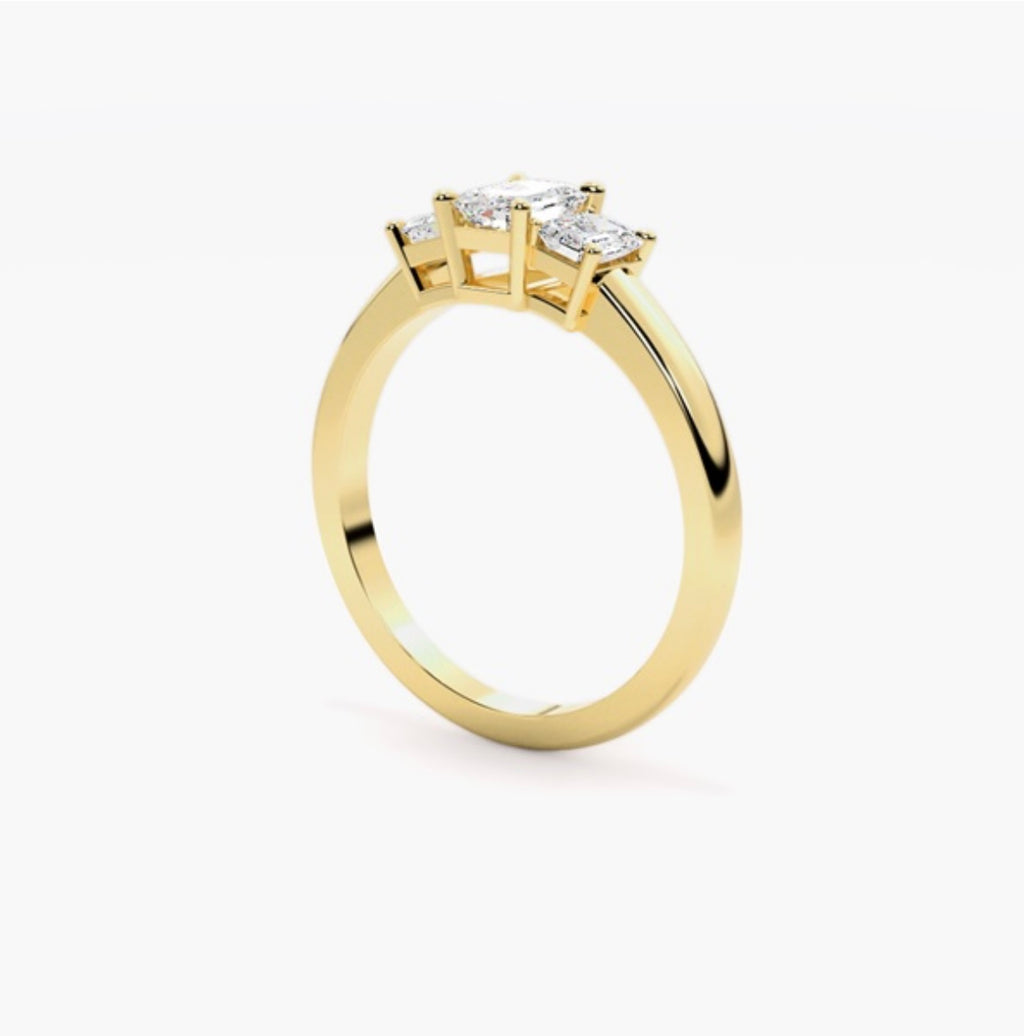0.75ct Emerald Cut Lab Grown Diamond Trilogy Engagement Ring with Emerald Side Stones – IGI Certified